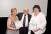 Dr. Nagib Callaos, General Chair, giving Dr. Risa Blair and Dr. Tina M. Serafini the outstanding paper award for the paper entitled: "Integration of Education: Using Social Media Networks to Engage Students."